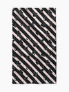 Towel with black cat pattern on diagonal striped background