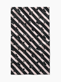 Towel with black cat pattern on diagonal striped background