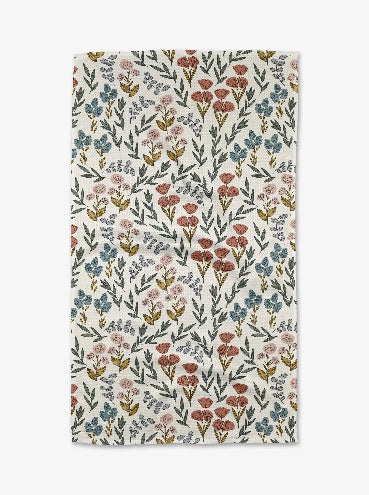 Floral patterned towel with small flowers on a white background