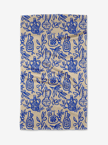 Patterned fabric with blue designs on a beige background